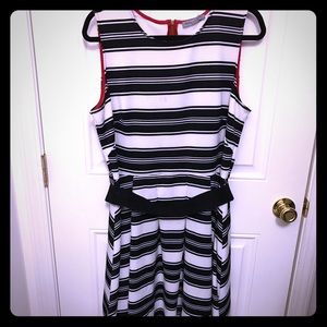 Black and white striped dress with a belt